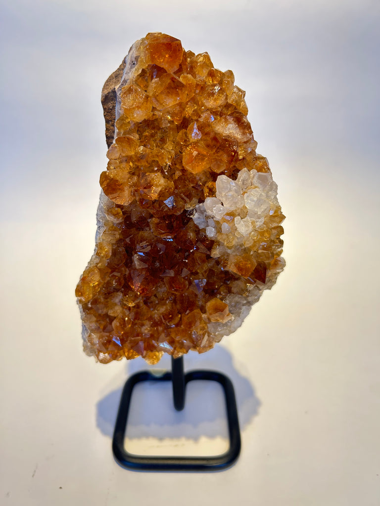 Citrine on stand with calicite flower cluster