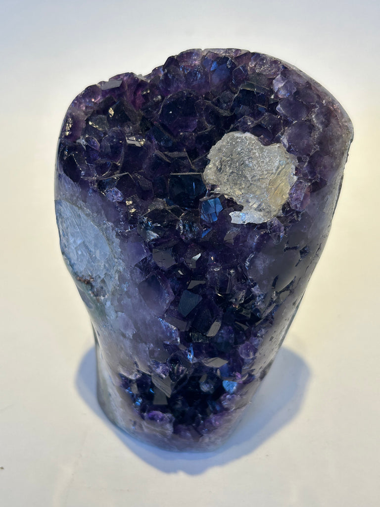 Dark Amethyst cut base with Calcite crystal
